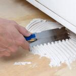 QEP 1/4 in. x 1/4 in. x 1/4 in. Comfort Grip Square-Notch Margin Flooring Trowel with Bucket Hook (42114)